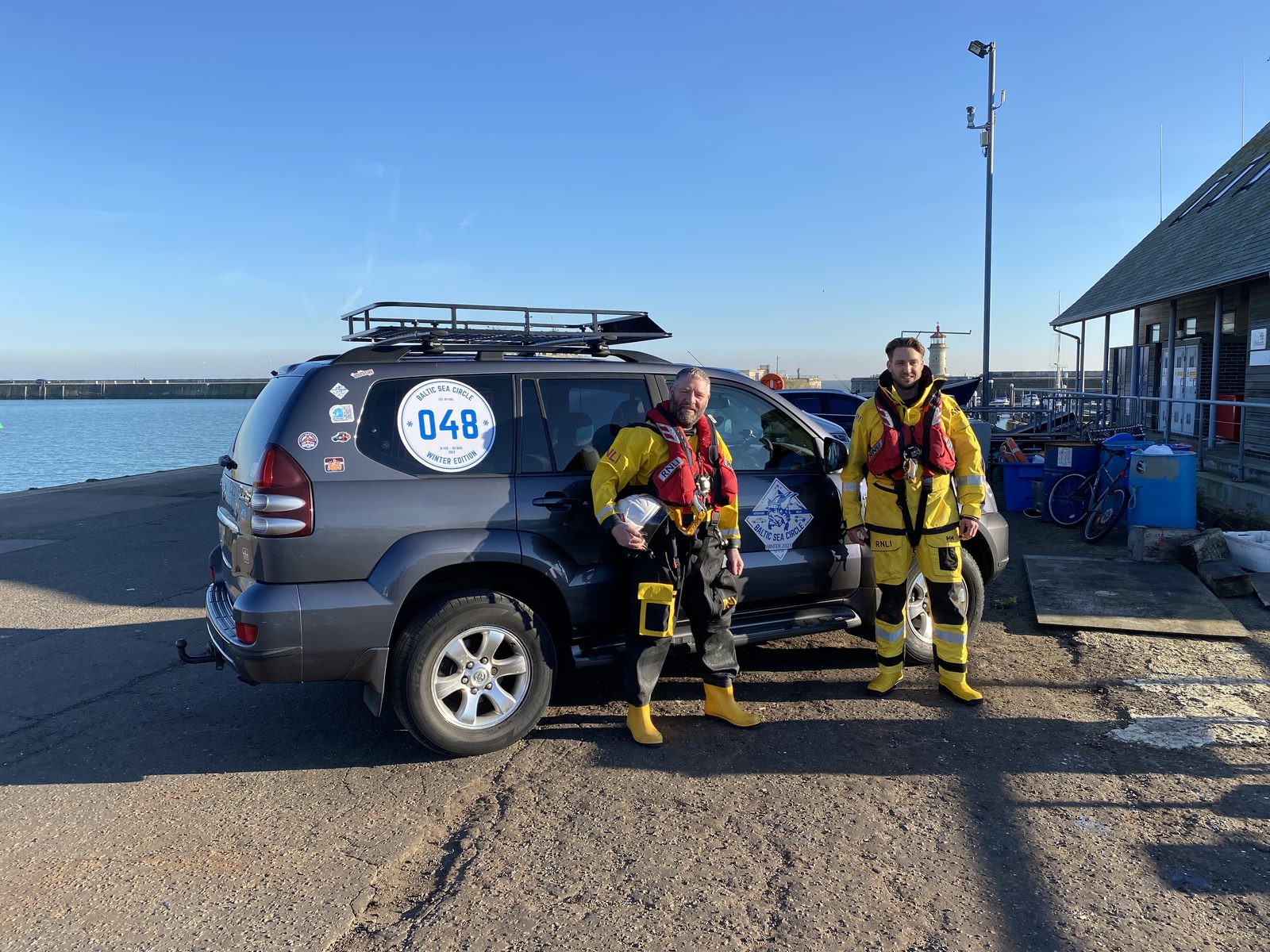 Jason Crome and me in full lifeboat kit next to car 048. The Land Cruiser declined the dry suit