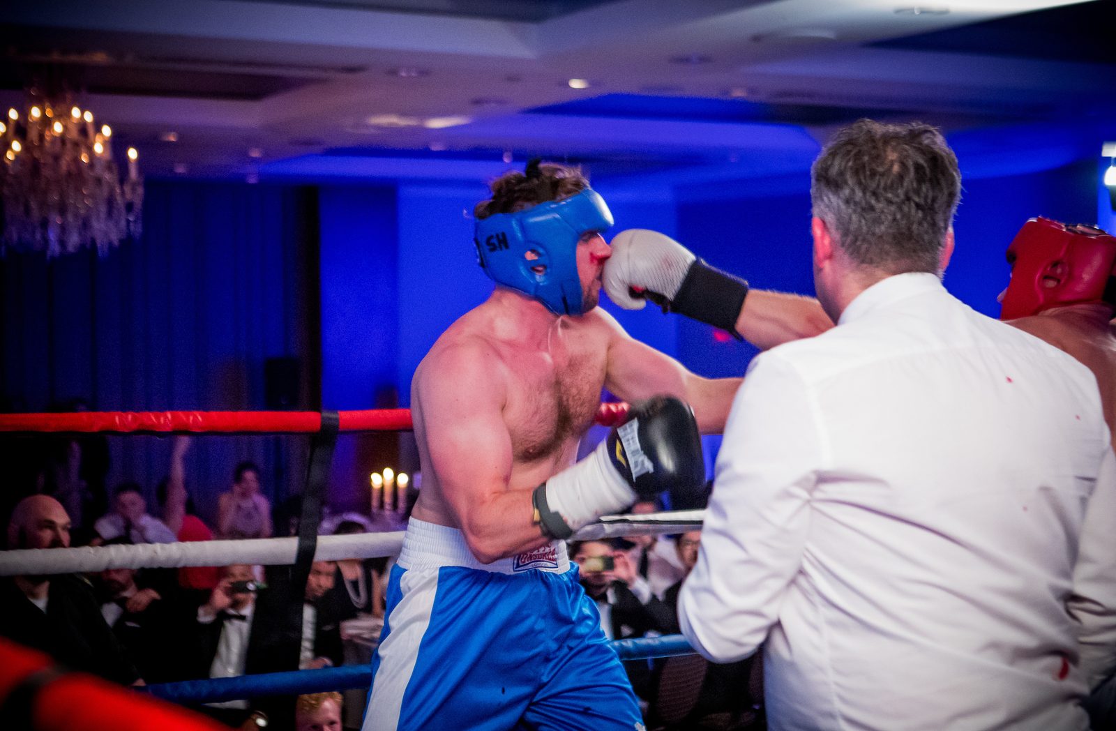 Me in blue, demonstrating an advanced technique known as blocking with the face