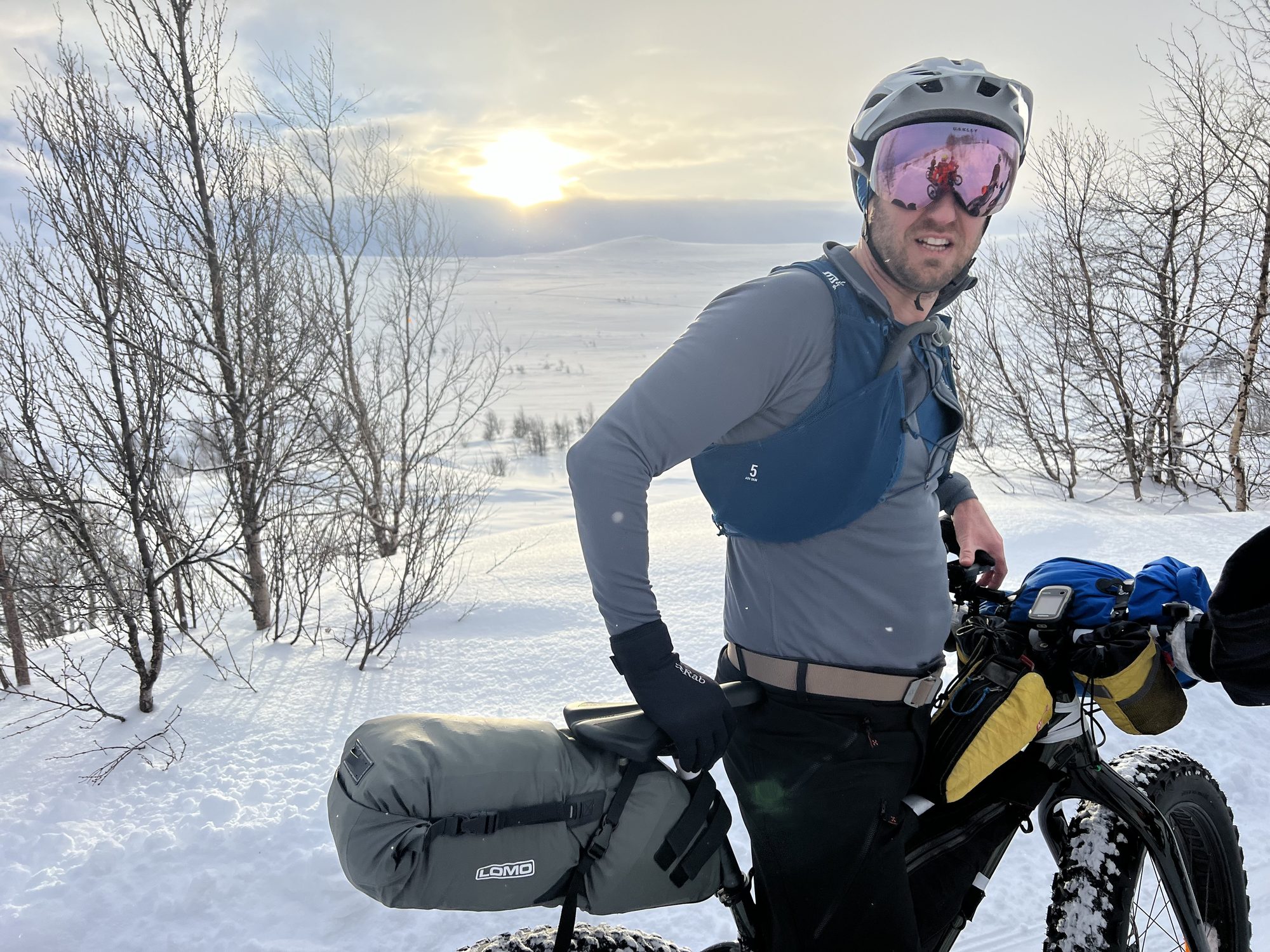 Low sun, loaded bike, still smiling. Early days