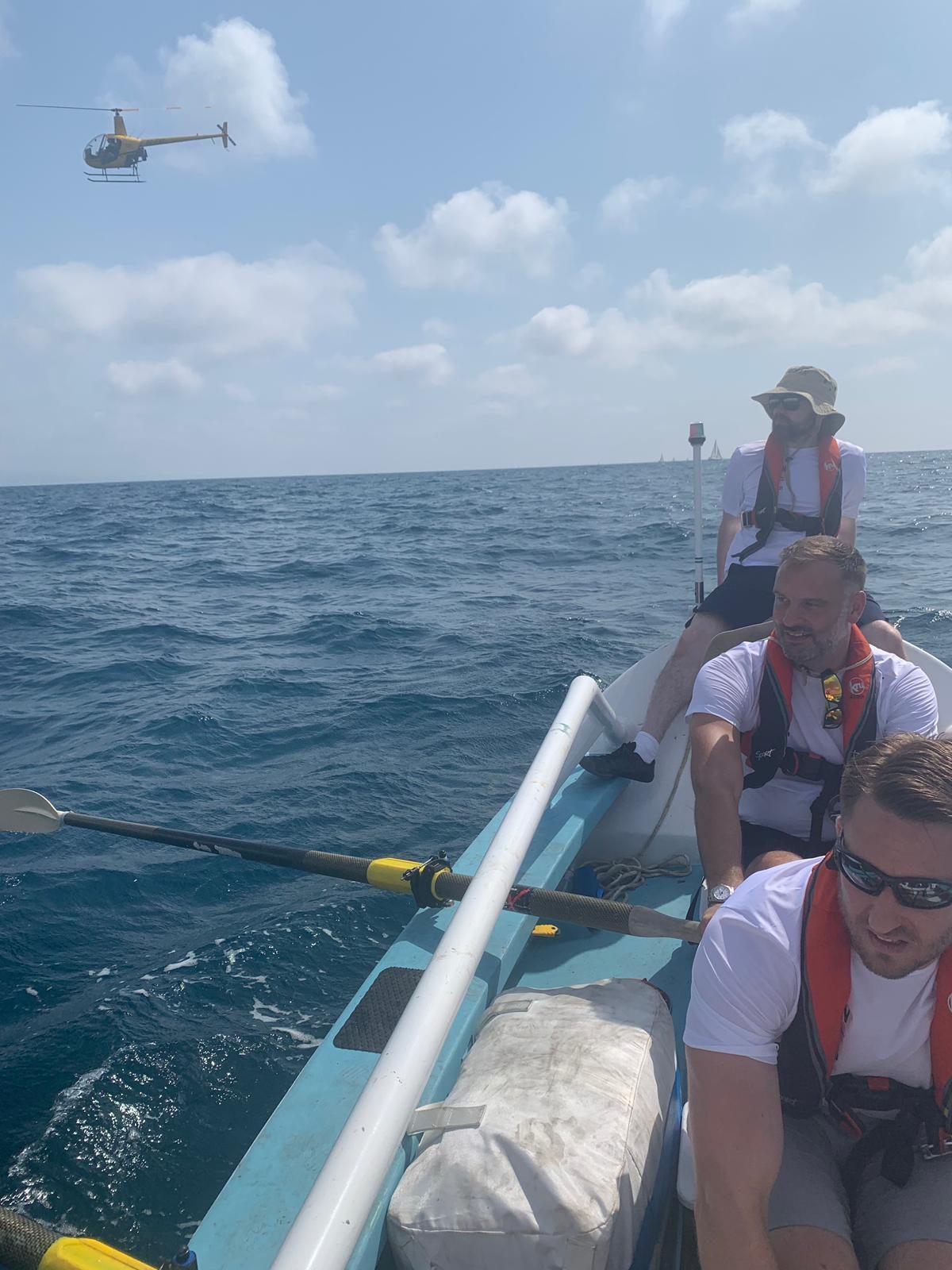 Under oars, with company overhead